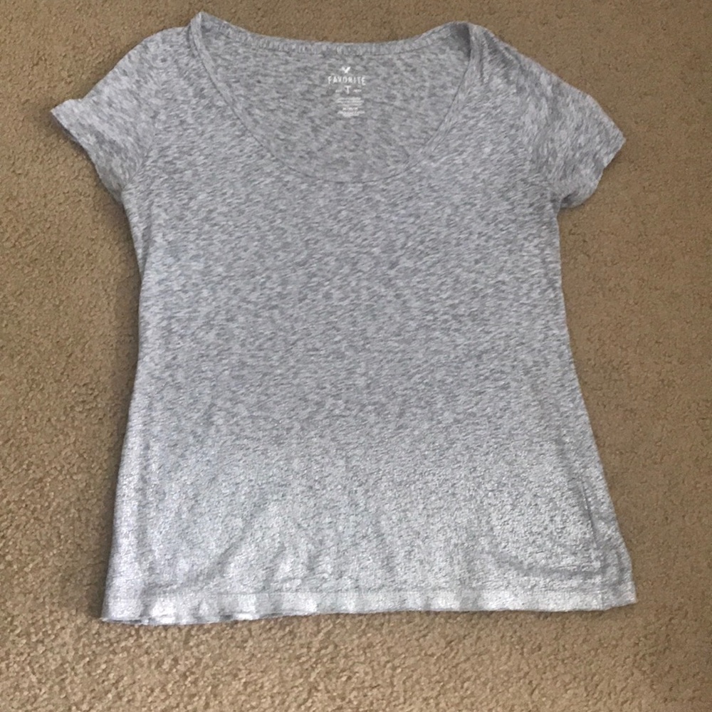 gray shirt with glitter at bottom